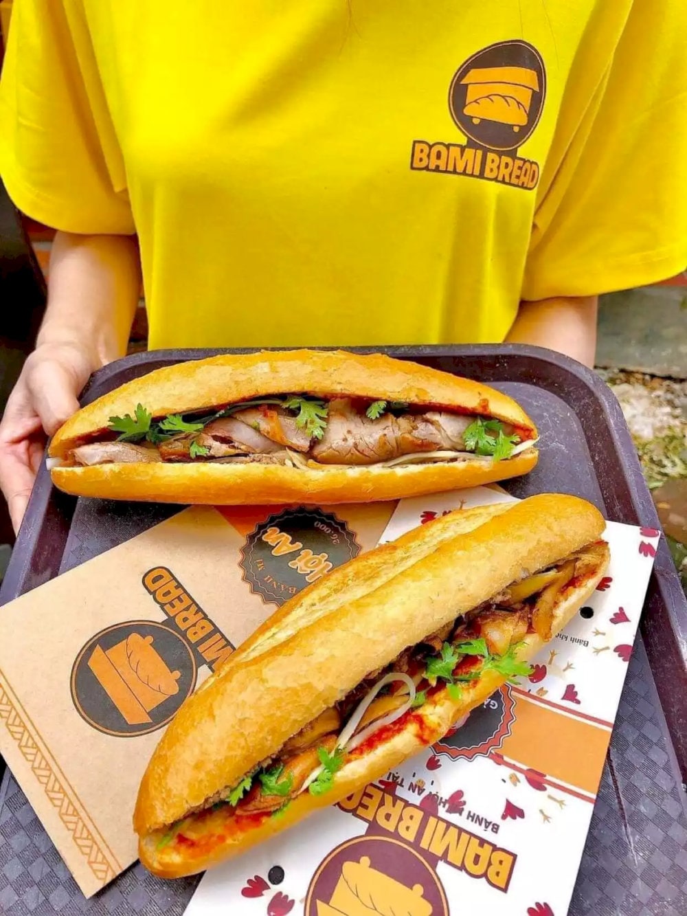 The blend of the fragrant herbs, the crunch of the bread, and the savory filling creates a satisfying, well-rounded sandwich